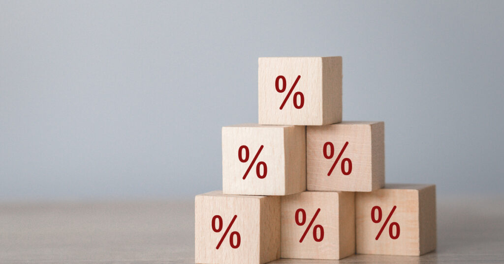 Arranging wood block stacking with icon percent symbol upward direction. Enhancement & Advantage Plans