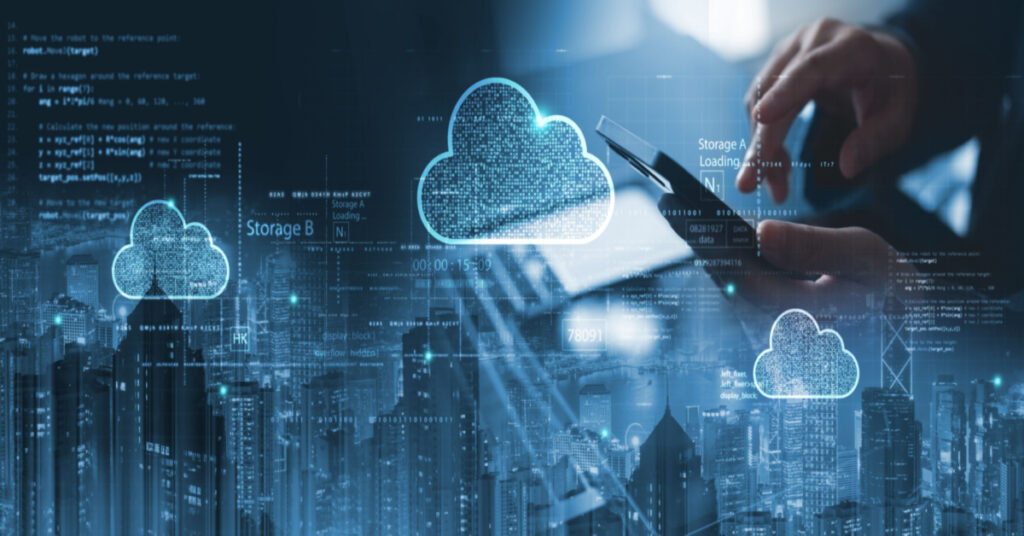 Businessman accessing cloud computing network on a handheld device.