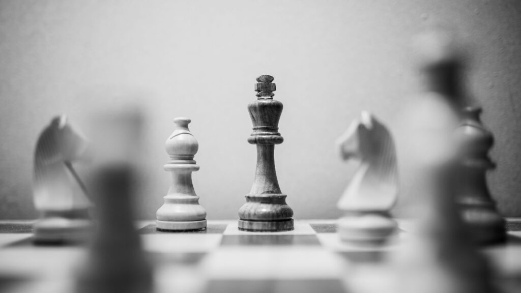 Strategic planning concept with chess pieces symbolizing a Dynamics NAV to Dynamics 365 Business Central ERP migration strategy.