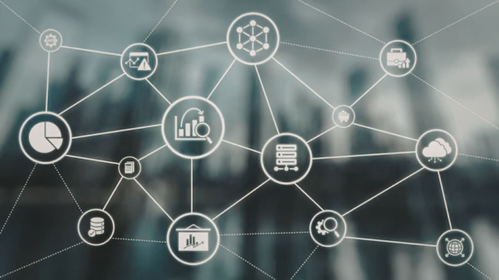 Connected digital network with analytics, cloud, finance, and automation icons representing integrated business systems and data flow